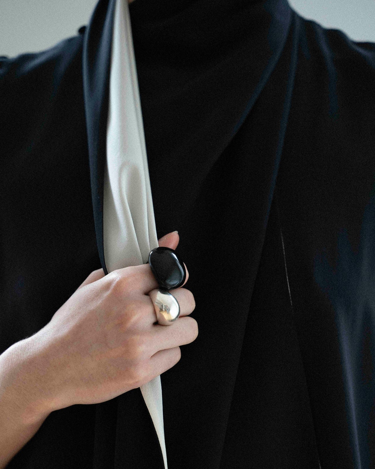 Camille Surault's iconic BLOWBLOW ring in black resin.