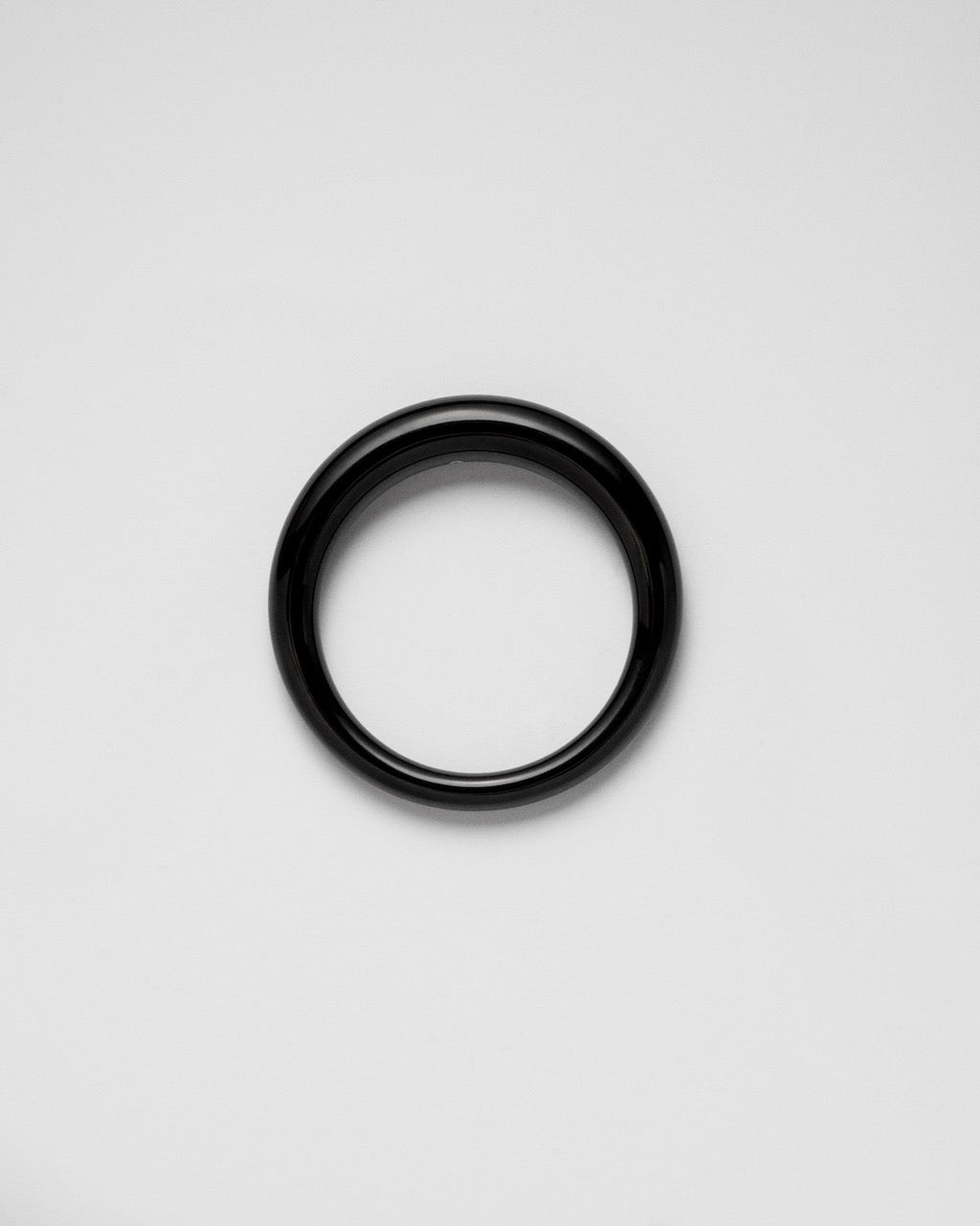 Camille Surault's BLOWBLOW bangle in black resin. 