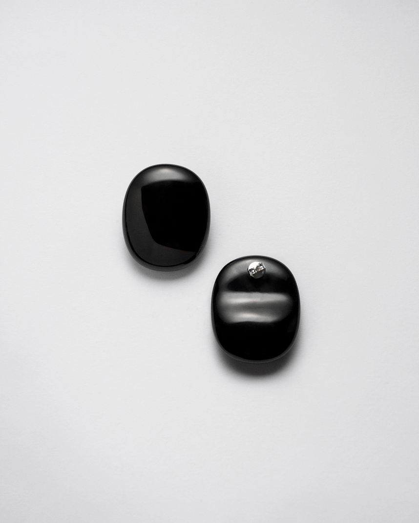Camille Surault's BLOWBLOW earrings large in black resin, back view. 
