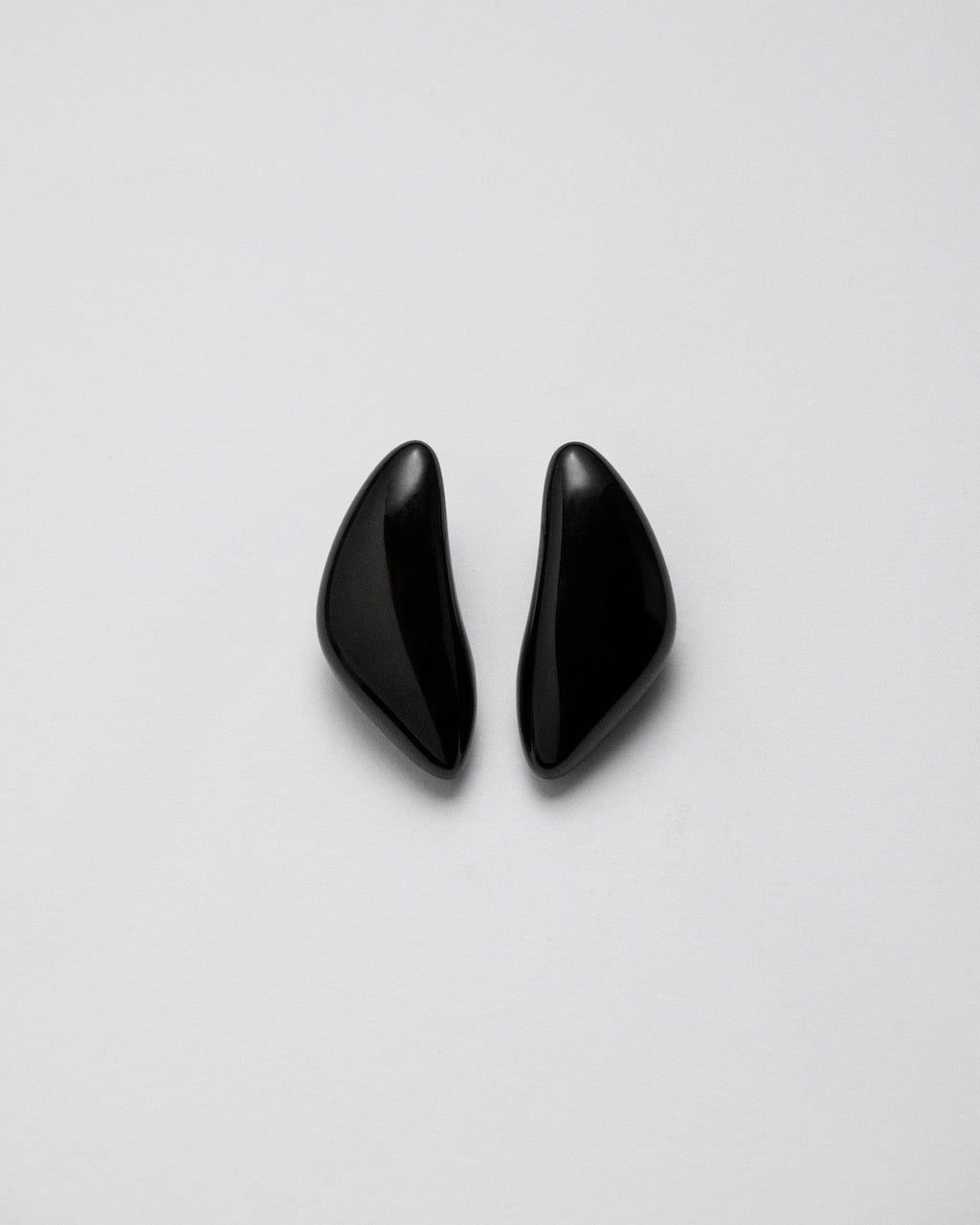 Camille Surault's DOWDOW earrings large in black resin. 